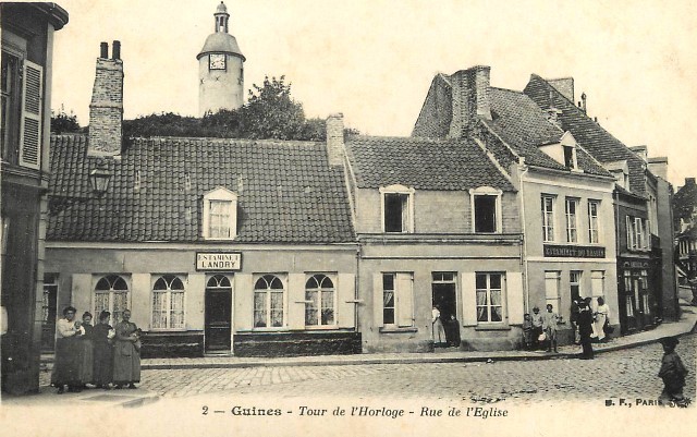 Guines pas de calais la rue de l eglise cpa