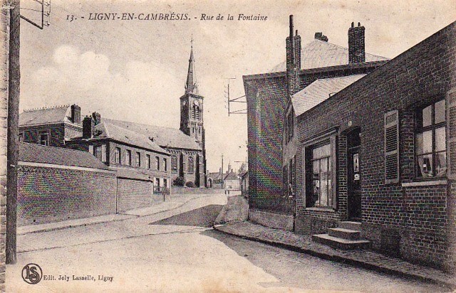 Ligny en cambresis 59 la rue de la fontaine cpa