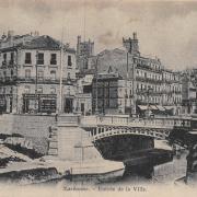 L' entrée de la ville (cpa)